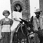 Lenora Turner & girl on donkey