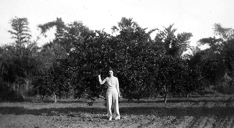 Nellie Britt in Taylor Orange Orchard