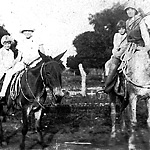 Vesta Taylor ridding with Grace, Nellie & Delanie Britt